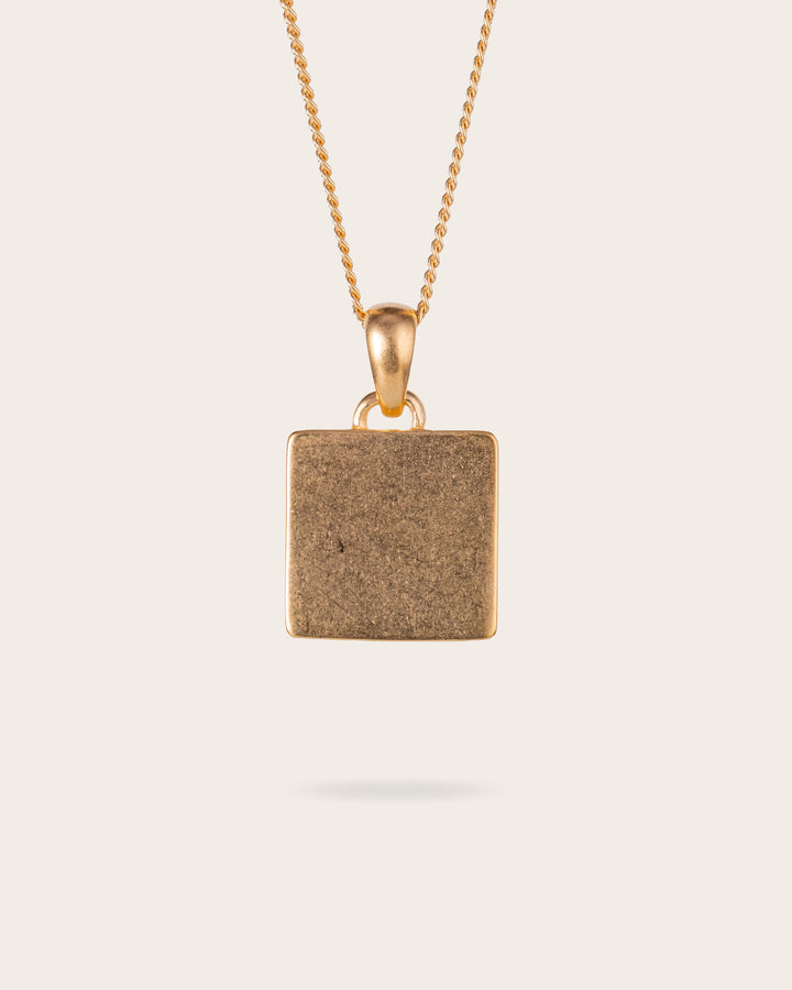 MIDNIGHT OYNX CROSS PENDANT IN GOLD