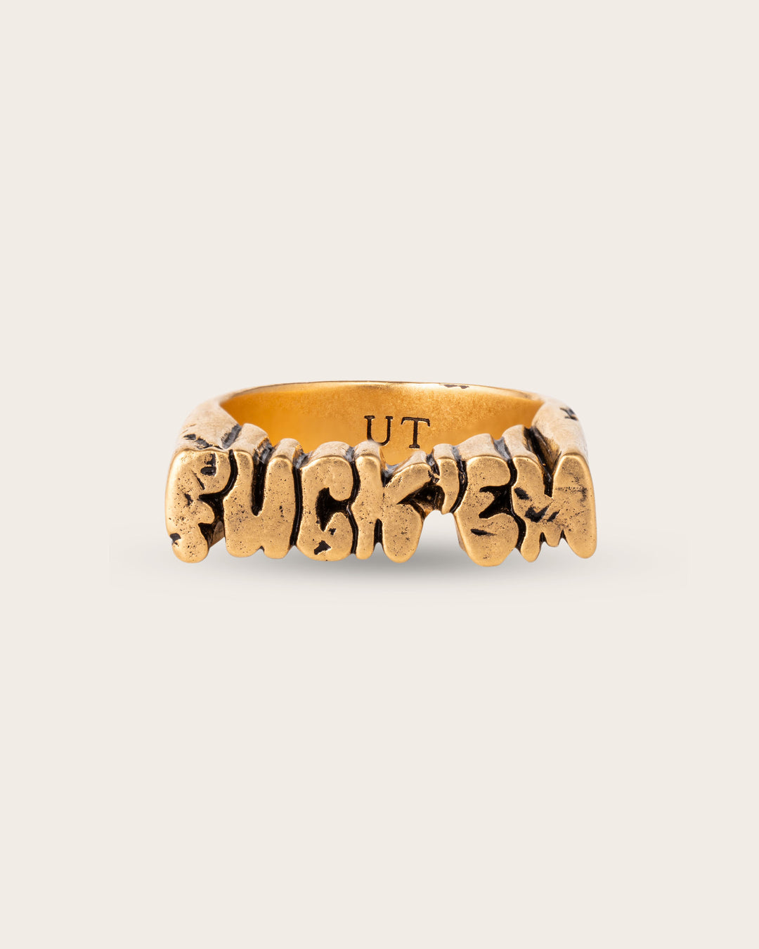 FUCK ‘EM RING IN GOLD