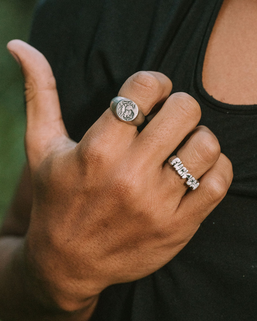 FUCK ‘EM RING IN SILVER