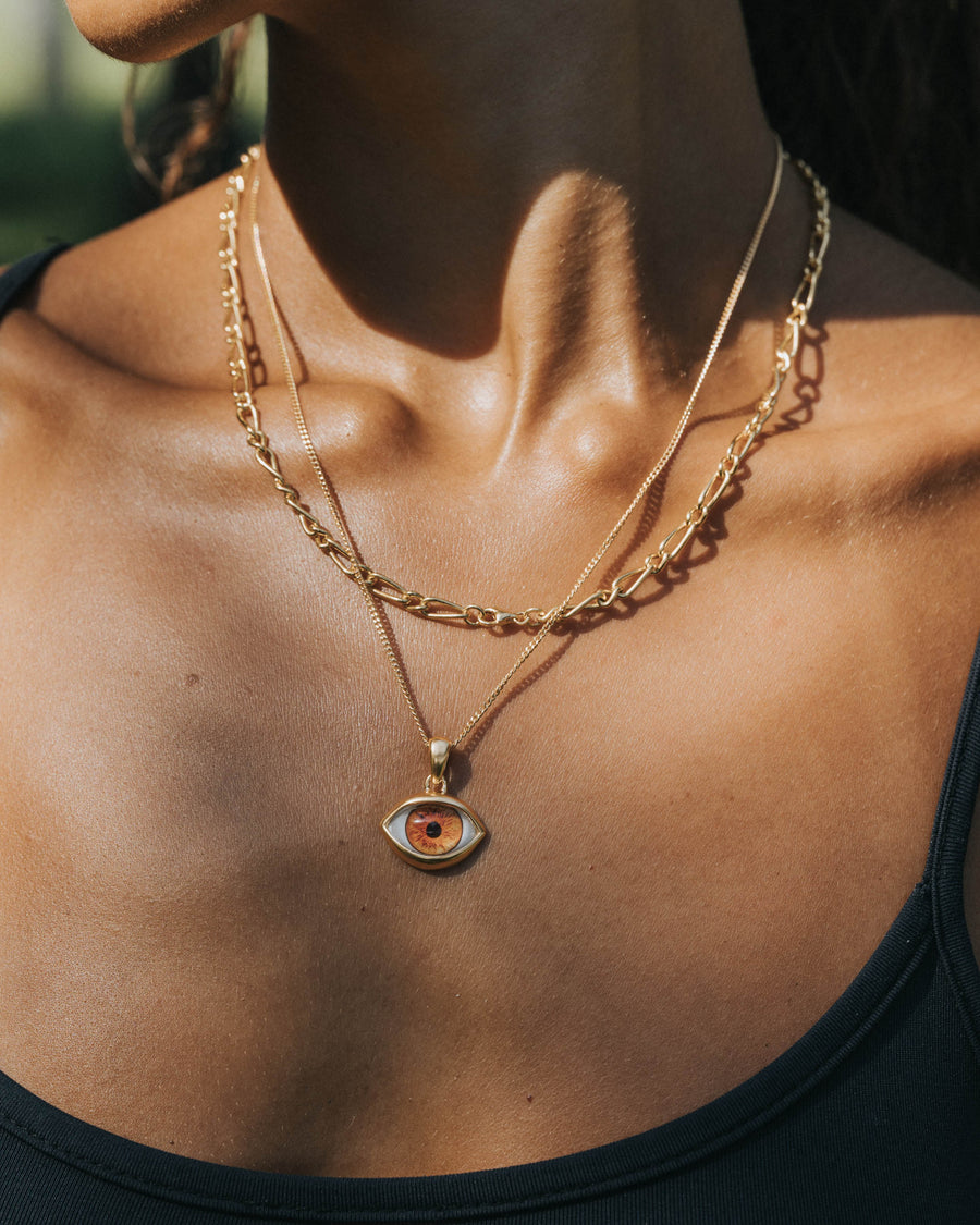 BROWN EYE PENDANT IN GOLD
