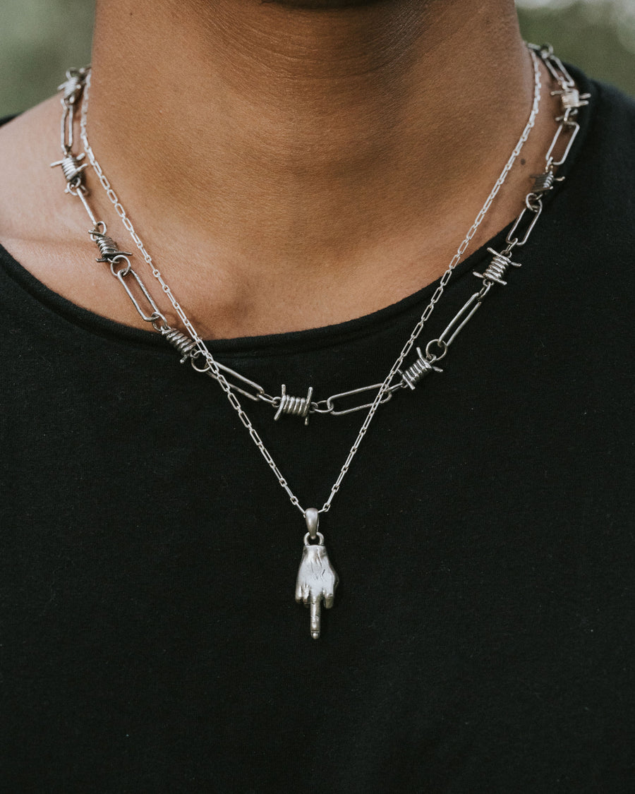 MIDDLE FINGER PENDANT IN SILVER