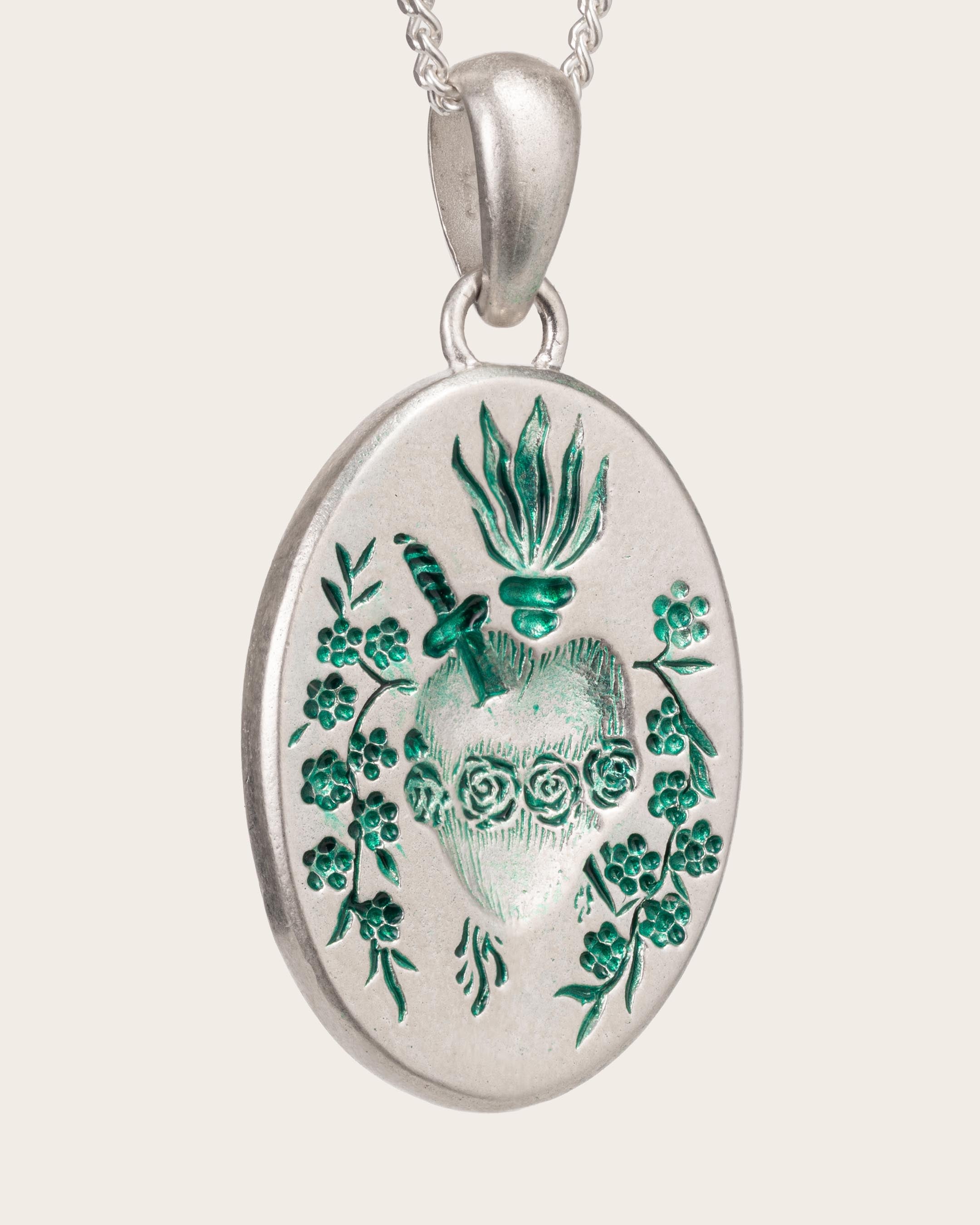 GREEN HEART PENDANT IN SILVER