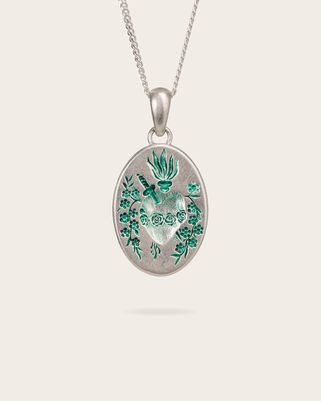 GREEN HEART PENDANT IN SILVER