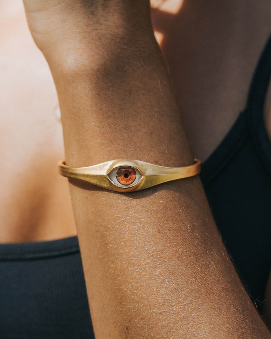 BROWN EYE CUFF IN GOLD