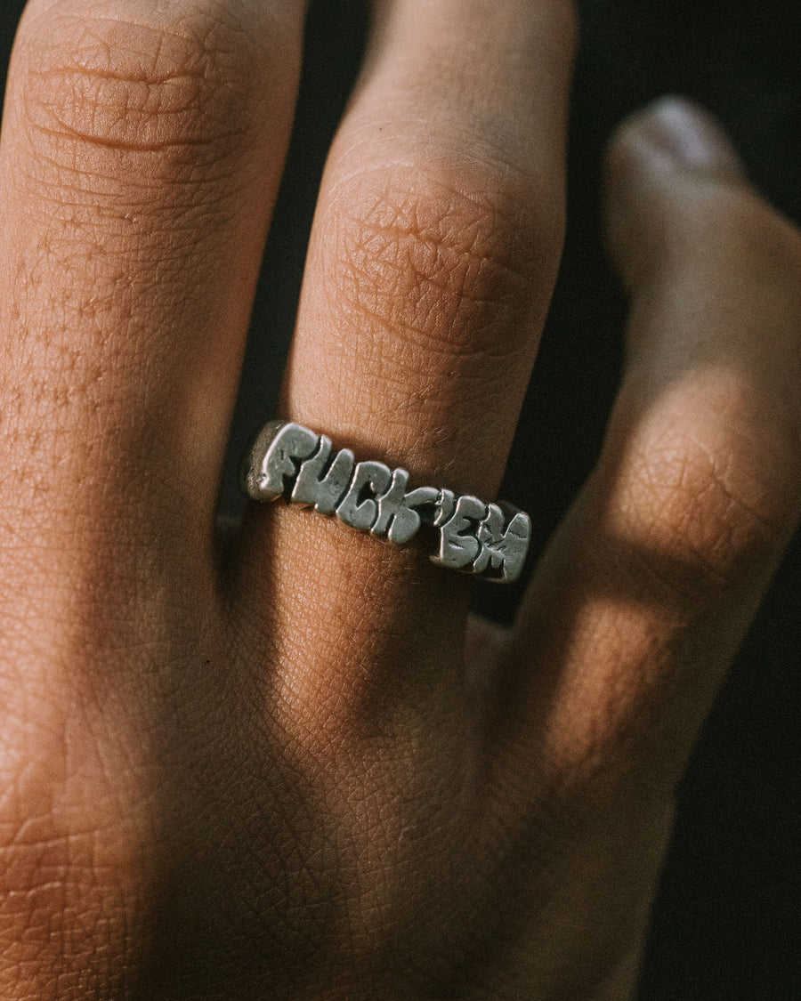 FUCK ‘EM RING IN SILVER