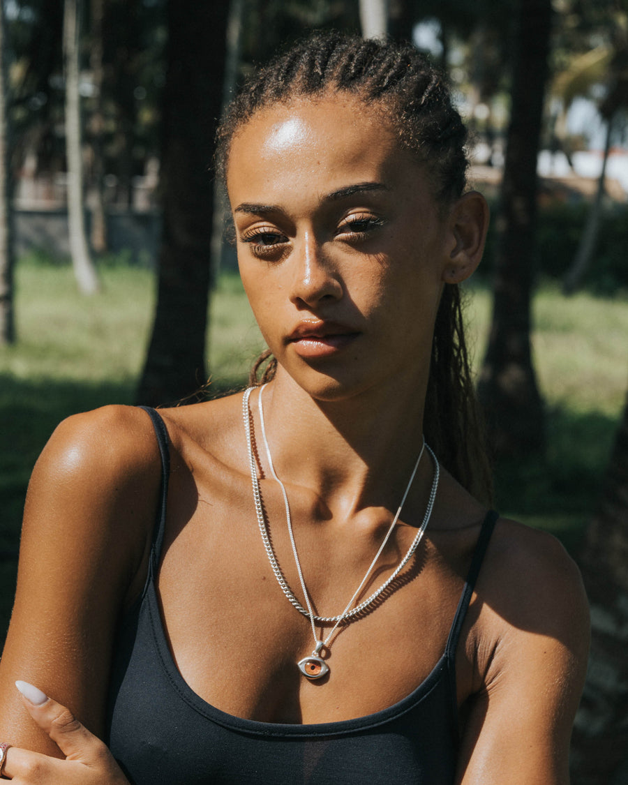 BROWN EYE PENDANT IN SILVER