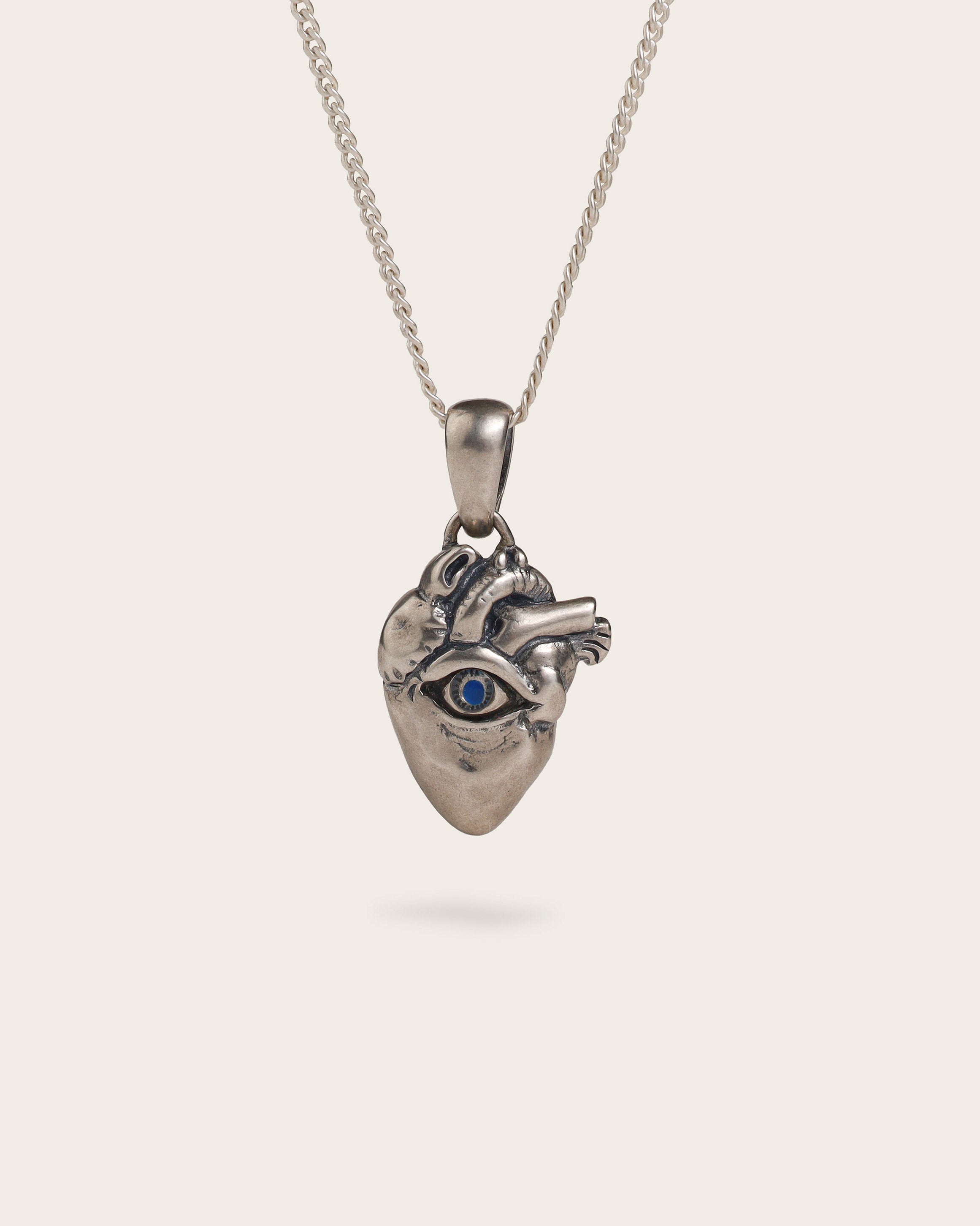 EYE HEART PENDANT WITH BLUE STONE IN SILVER