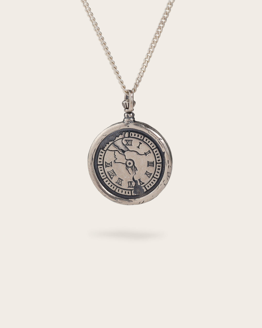 CRACKED CLOCK COMPASS NECKLACE IN SILVER