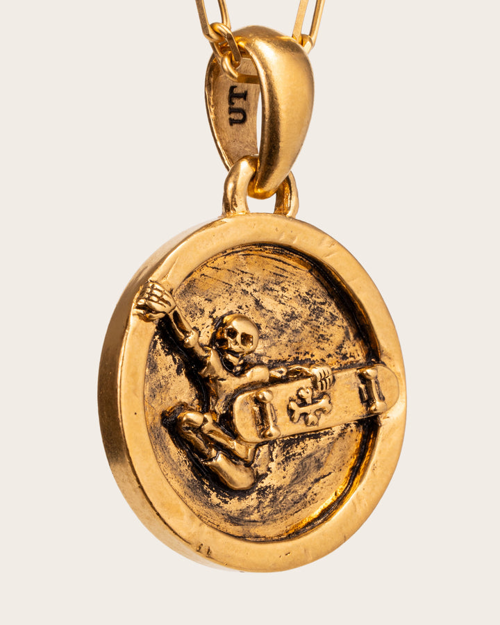 SKATER PENDANT IN GOLD