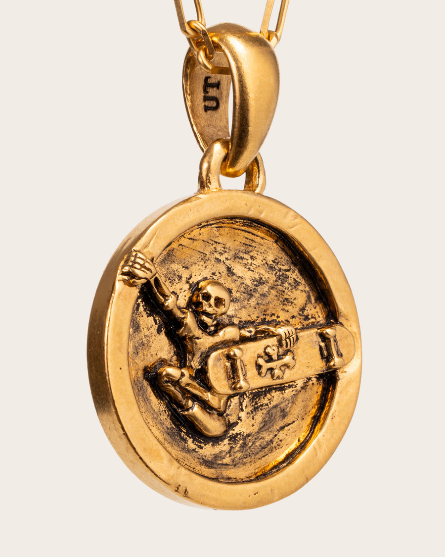 SKATER PENDANT IN GOLD