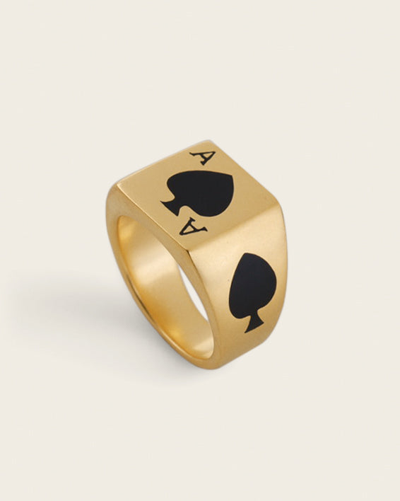 CARD RING WITH BLACK STONE IN GOLD