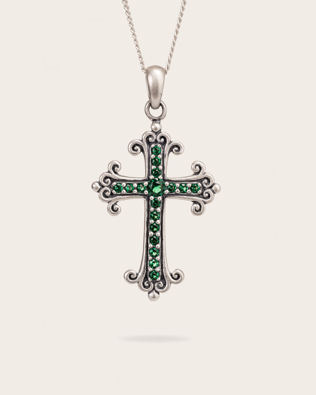 EMERALD CROSS PENDANT IN SILVER