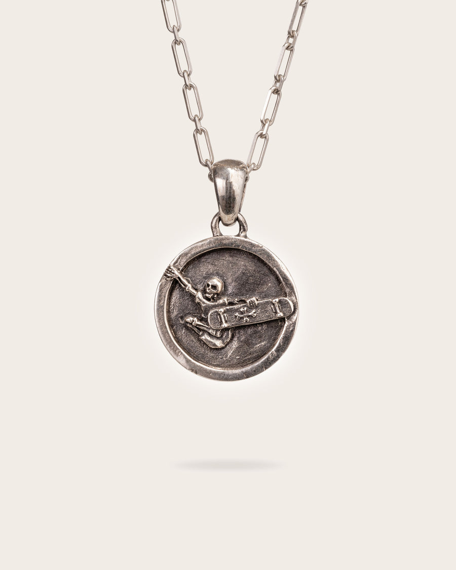SKATER PENDANT IN SILVER