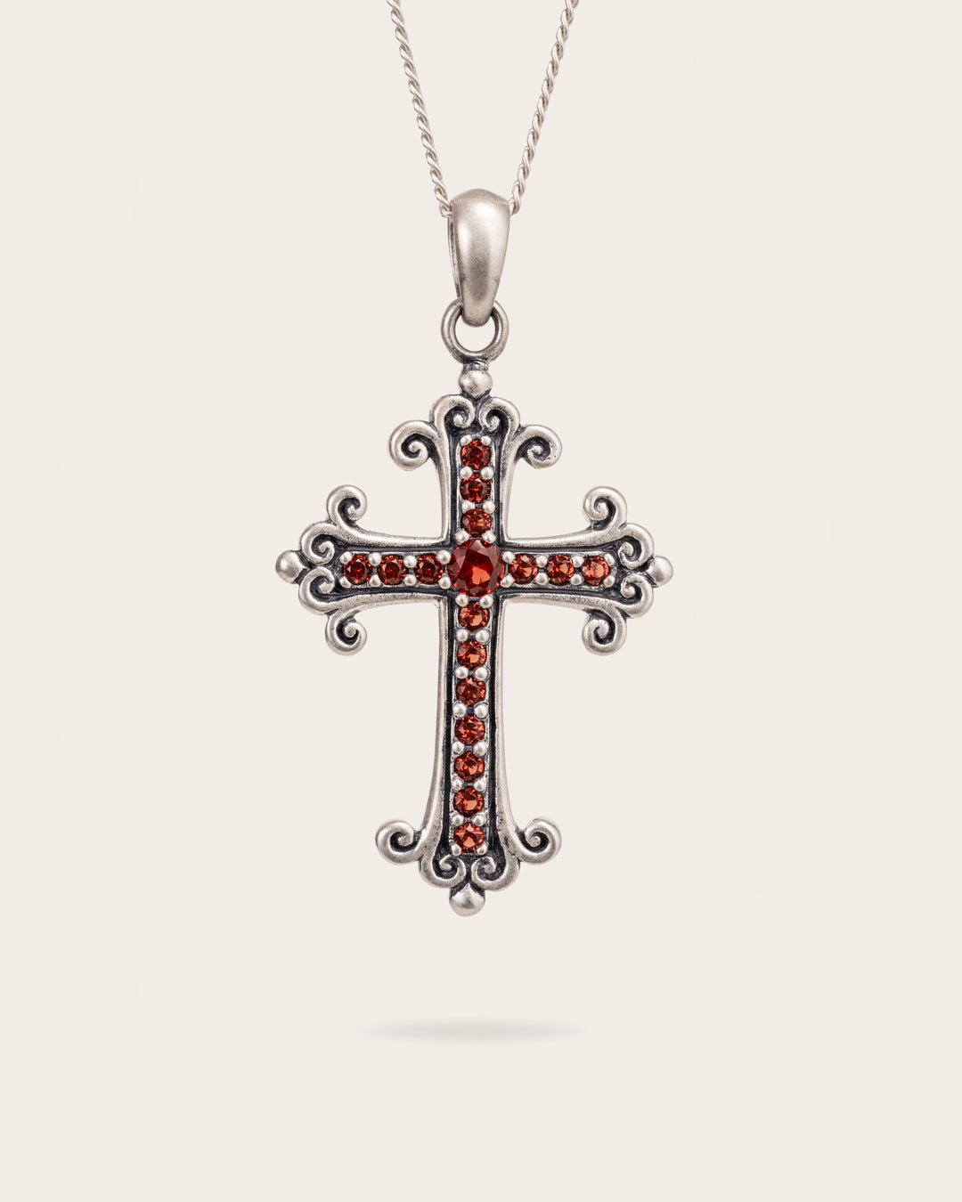RUBY RED CROSS PENDANT IN SILVER