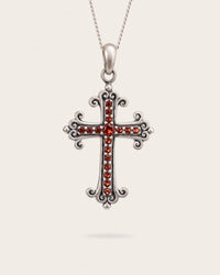 RUBY RED CROSS PENDANT IN SILVER