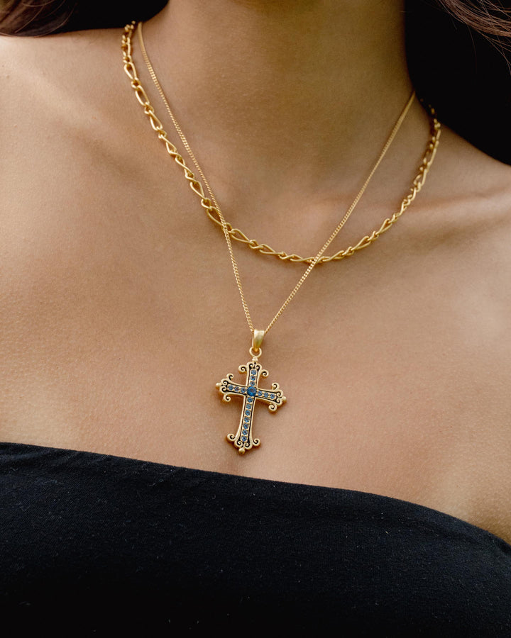 SAPPHIRE CROSS PENDANT IN GOLD