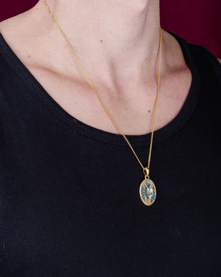BLUE HEART PENDANT IN GOLD