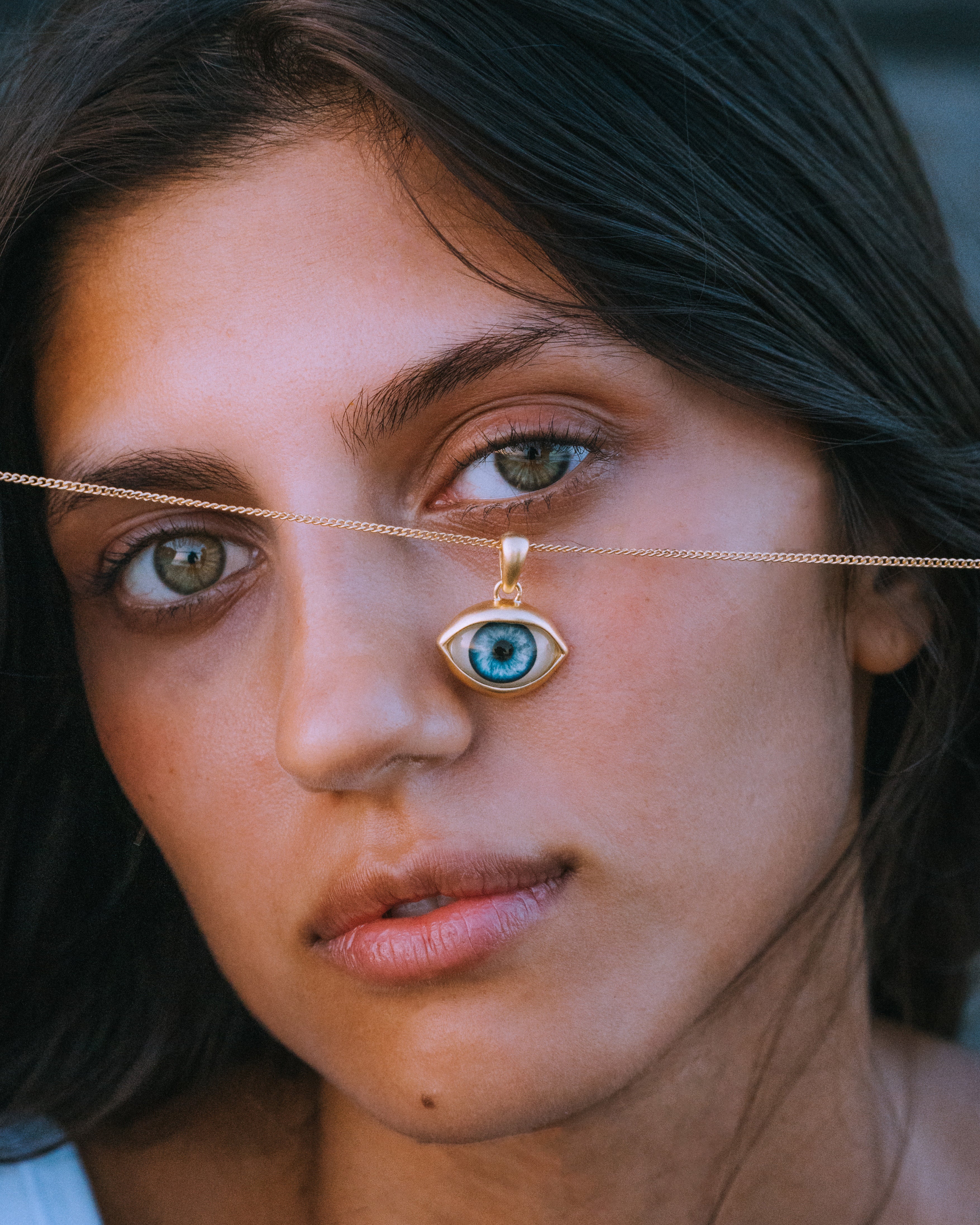 BLUE EYE PENDANT IN GOLD
