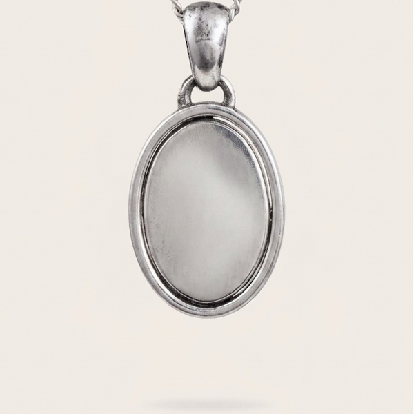 Vintage Reversible Oval Pendant In Silver