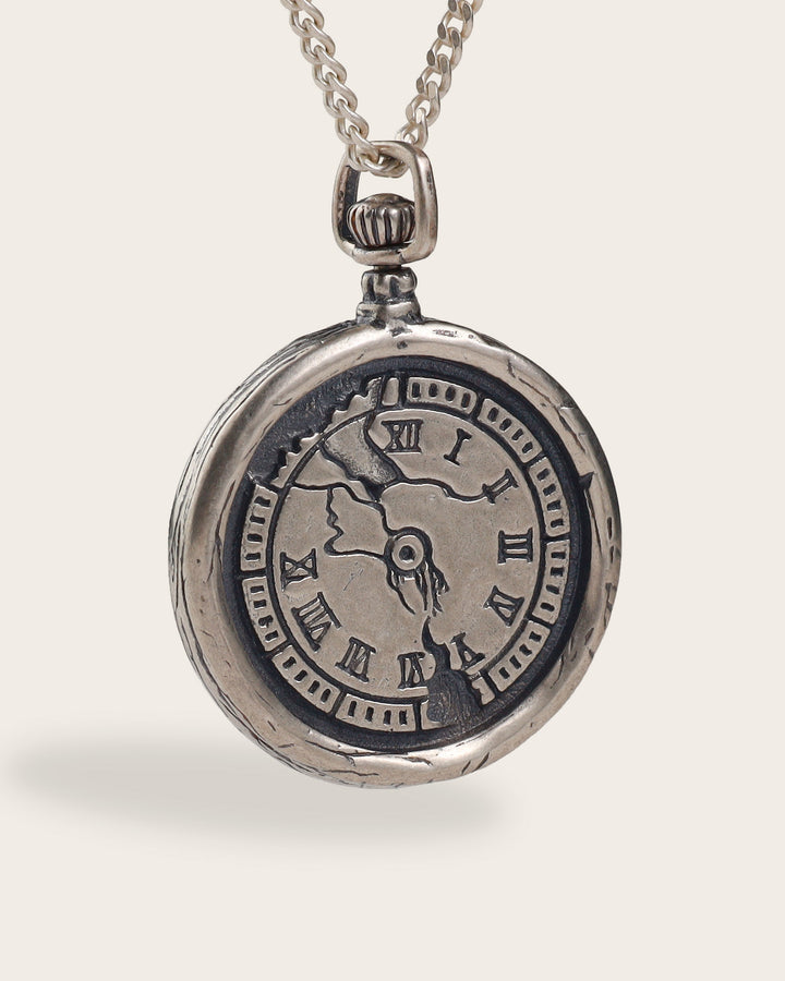 CRACKED CLOCK COMPASS NECKLACE IN SILVER