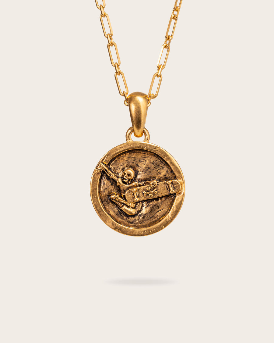 SKATER PENDANT IN GOLD