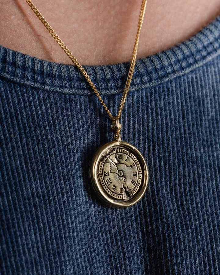 CRACKED CLOCK COMPASS IN GOLD