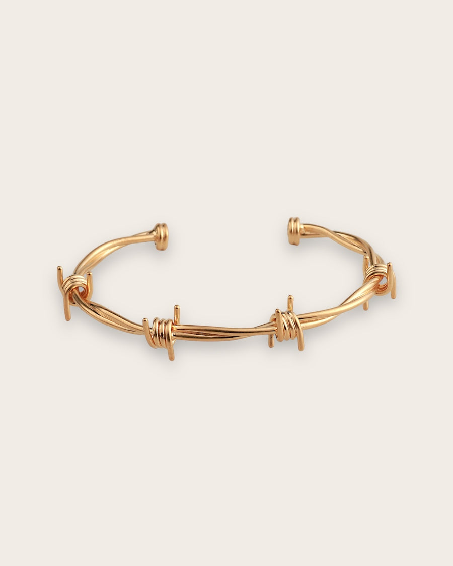 BARB WIRE CUFF IN GOLD