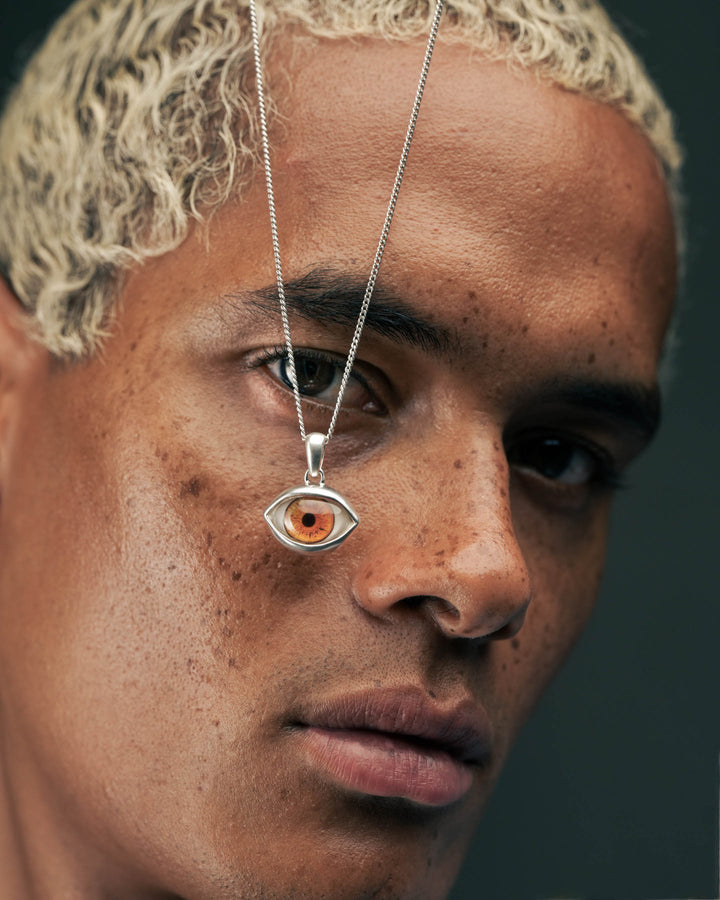BROWN EYE PENDANT IN SILVER