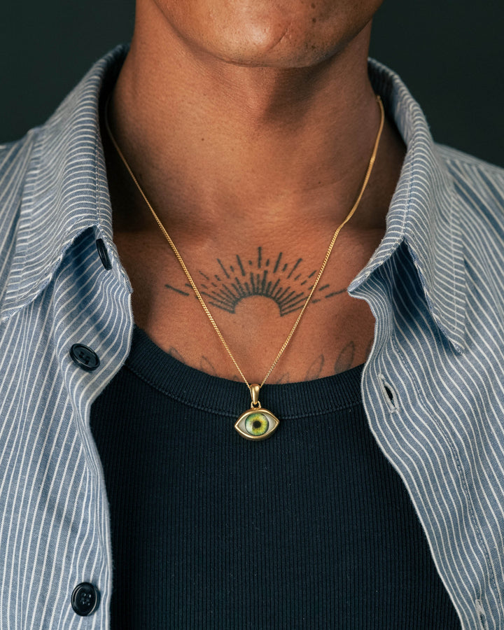 GREEN EYE PENDANT IN GOLD