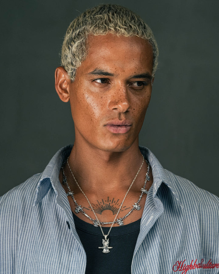 dog and dagger pendant in silver and dog & dagger neckchain in silver model photograph