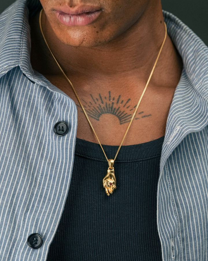 hand heart stone pendant in gold model photograph