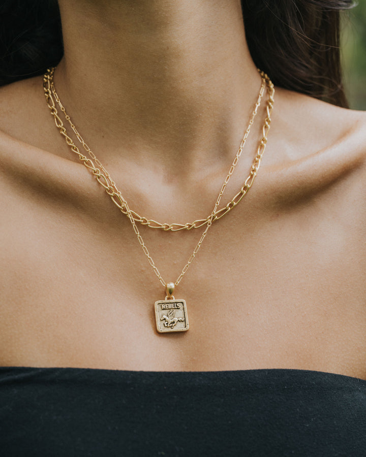 REBELS PENDANT IN GOLD