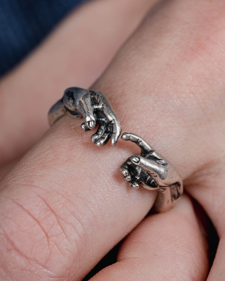 HAND OF GOD RING IN SILVER