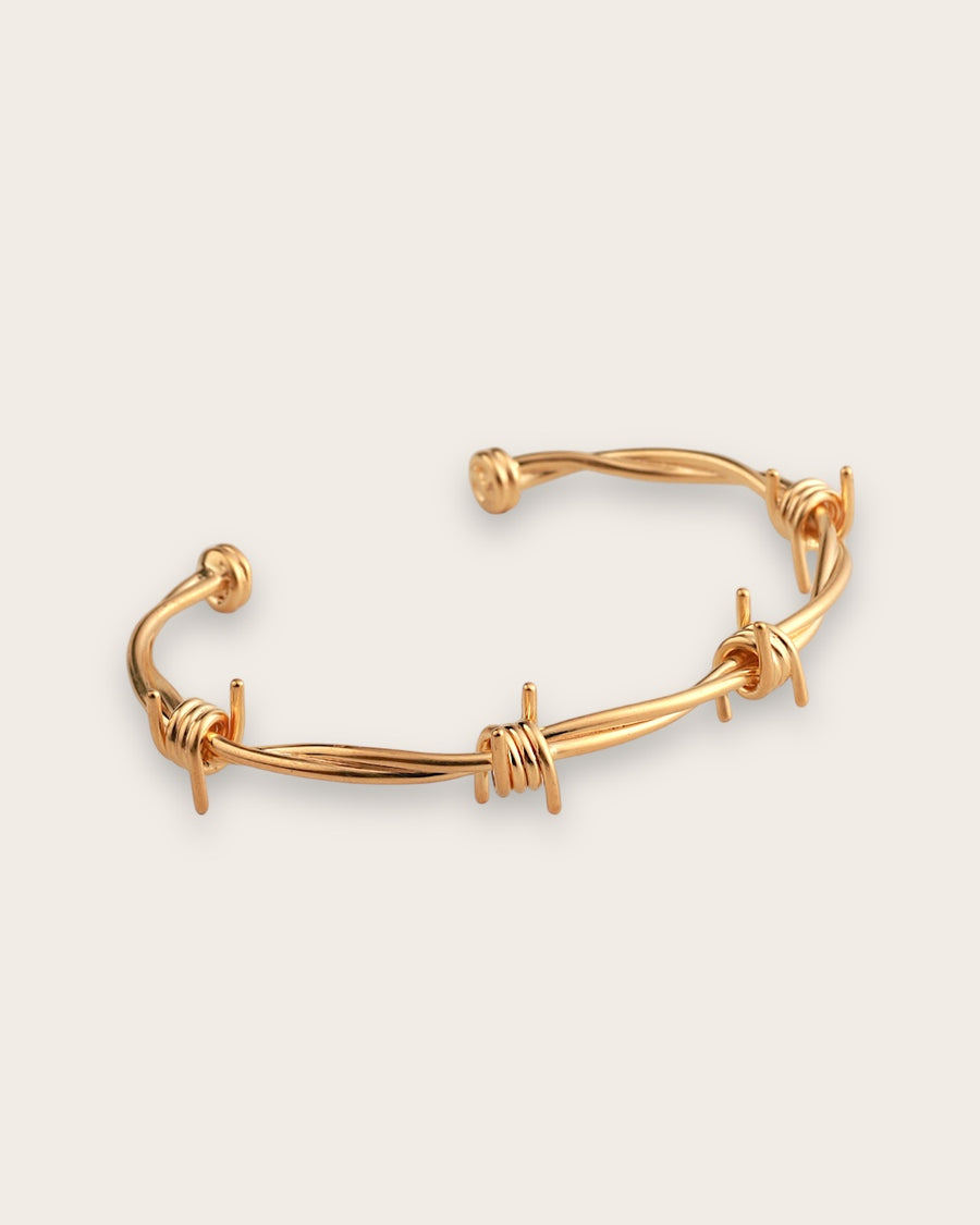 BARB WIRE CUFF IN GOLD