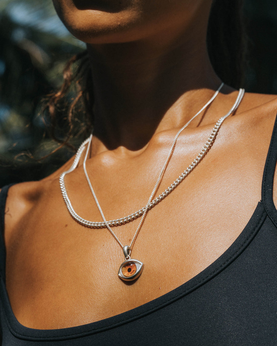 BROWN EYE PENDANT IN SILVER
