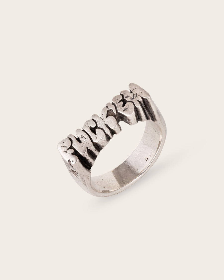 FUCK ‘EM RING IN SILVER