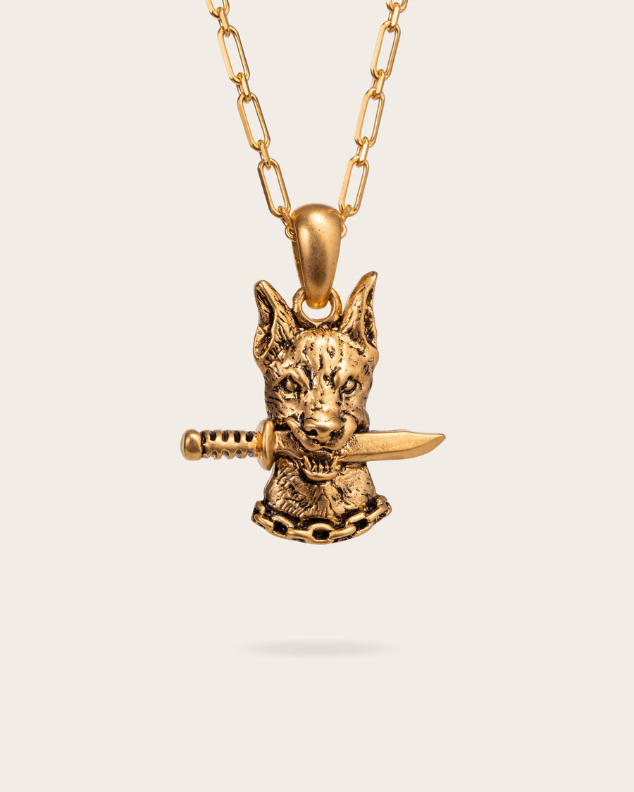 DOG AND DAGGER PENDANT IN GOLD