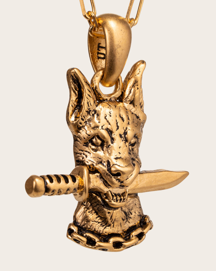 DOG AND DAGGER PENDANT IN GOLD