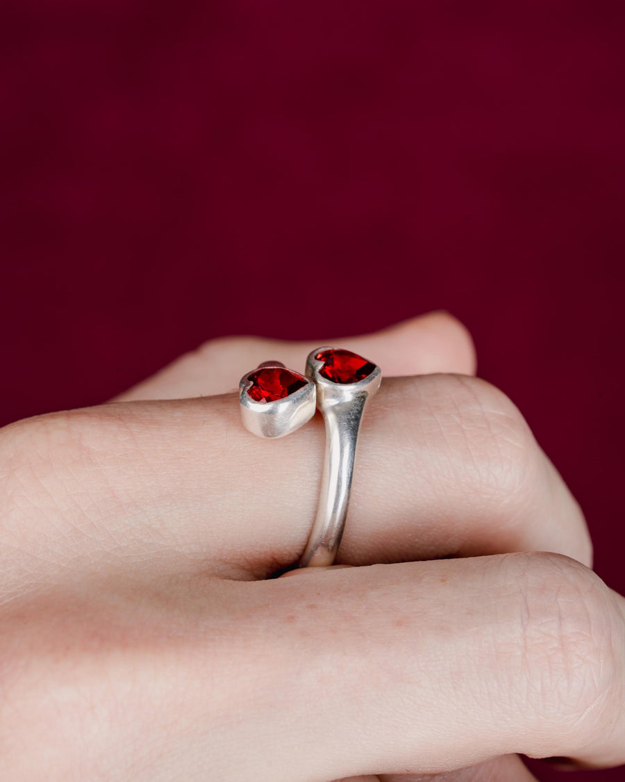 DOUBLE HEART RING WITH RED STONE IN SILVER