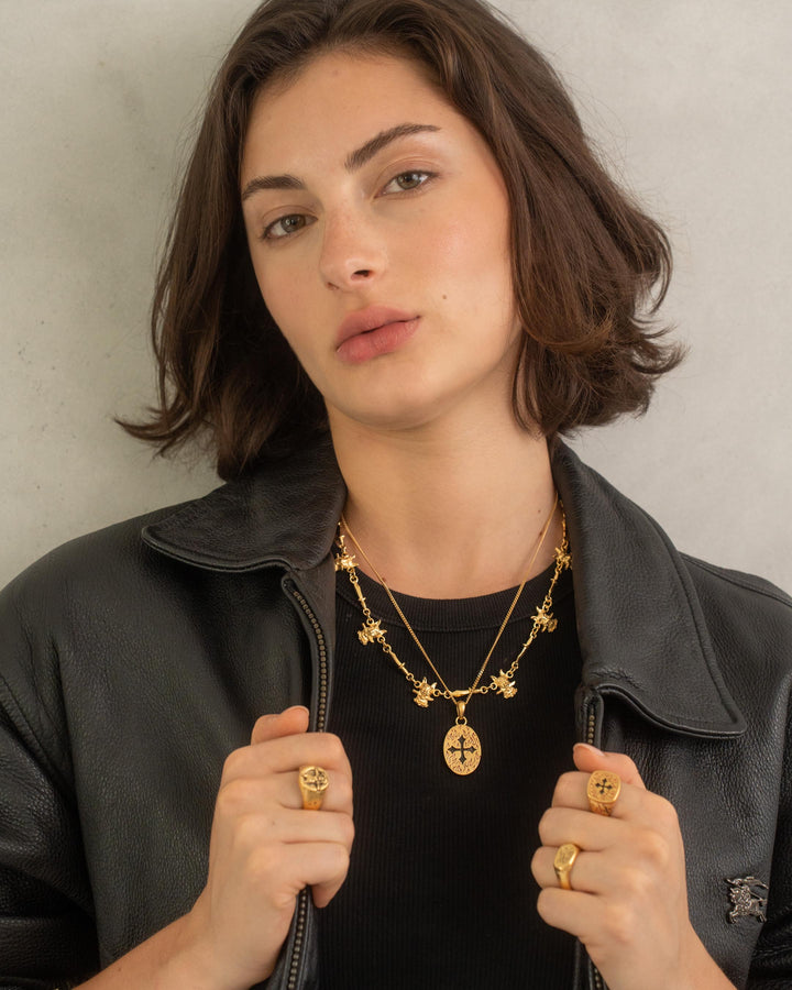 CROSS FIRE PENDANT IN GOLD