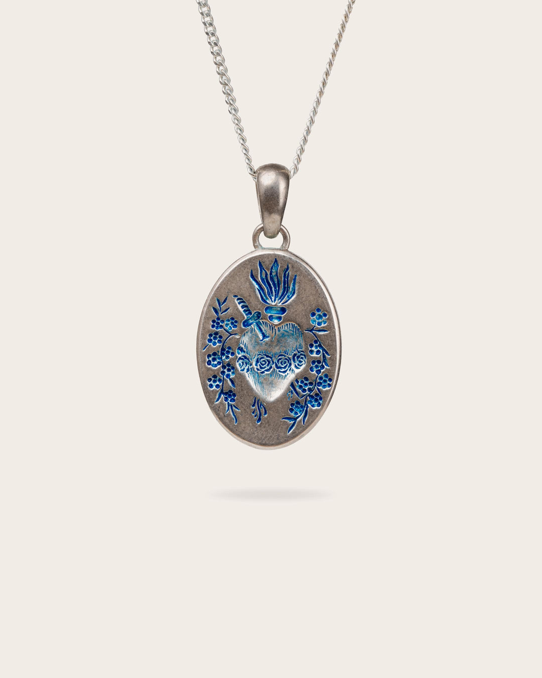 BLUE HEART PENDANT IN SILVER