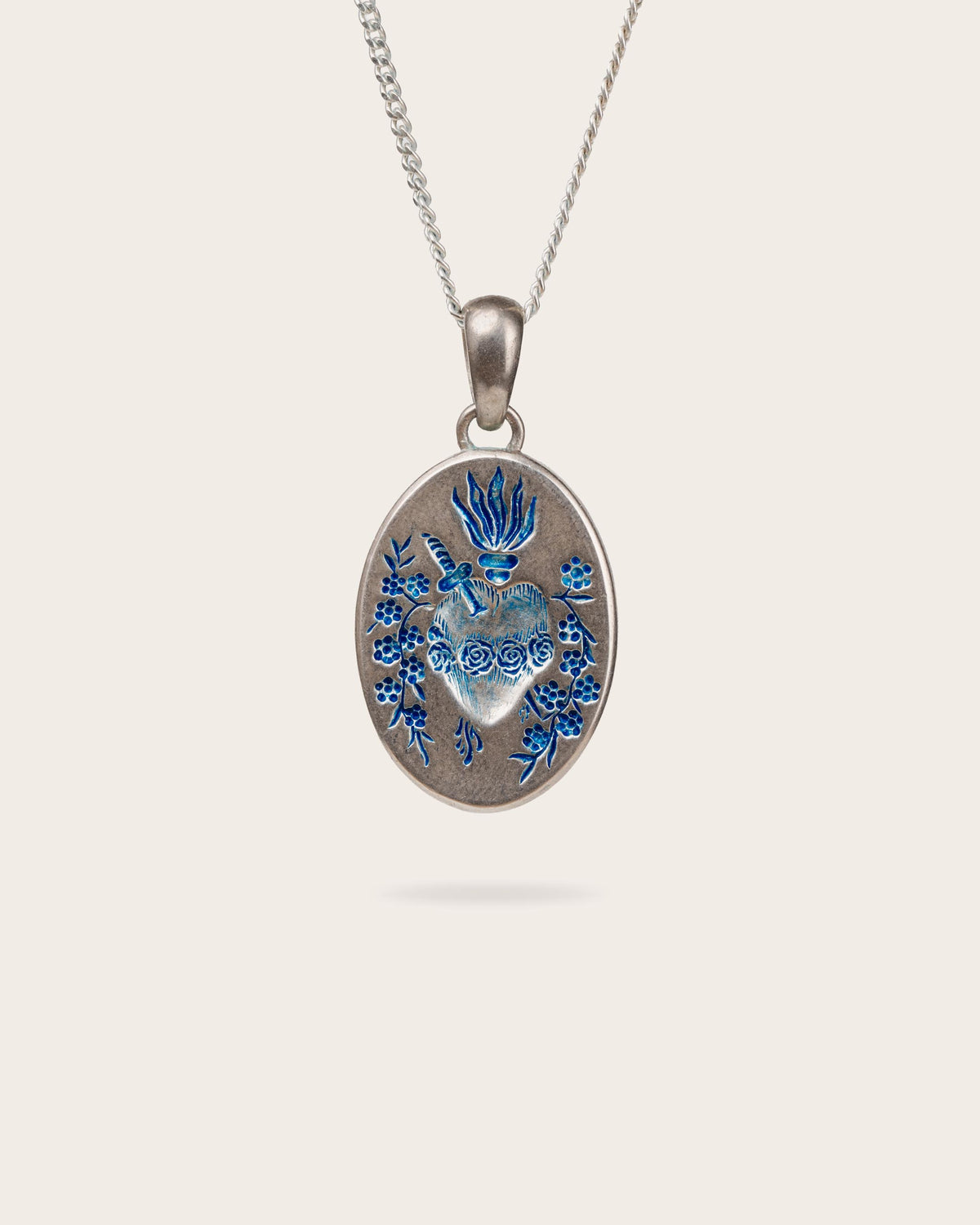 BLUE HEART PENDANT IN SILVER