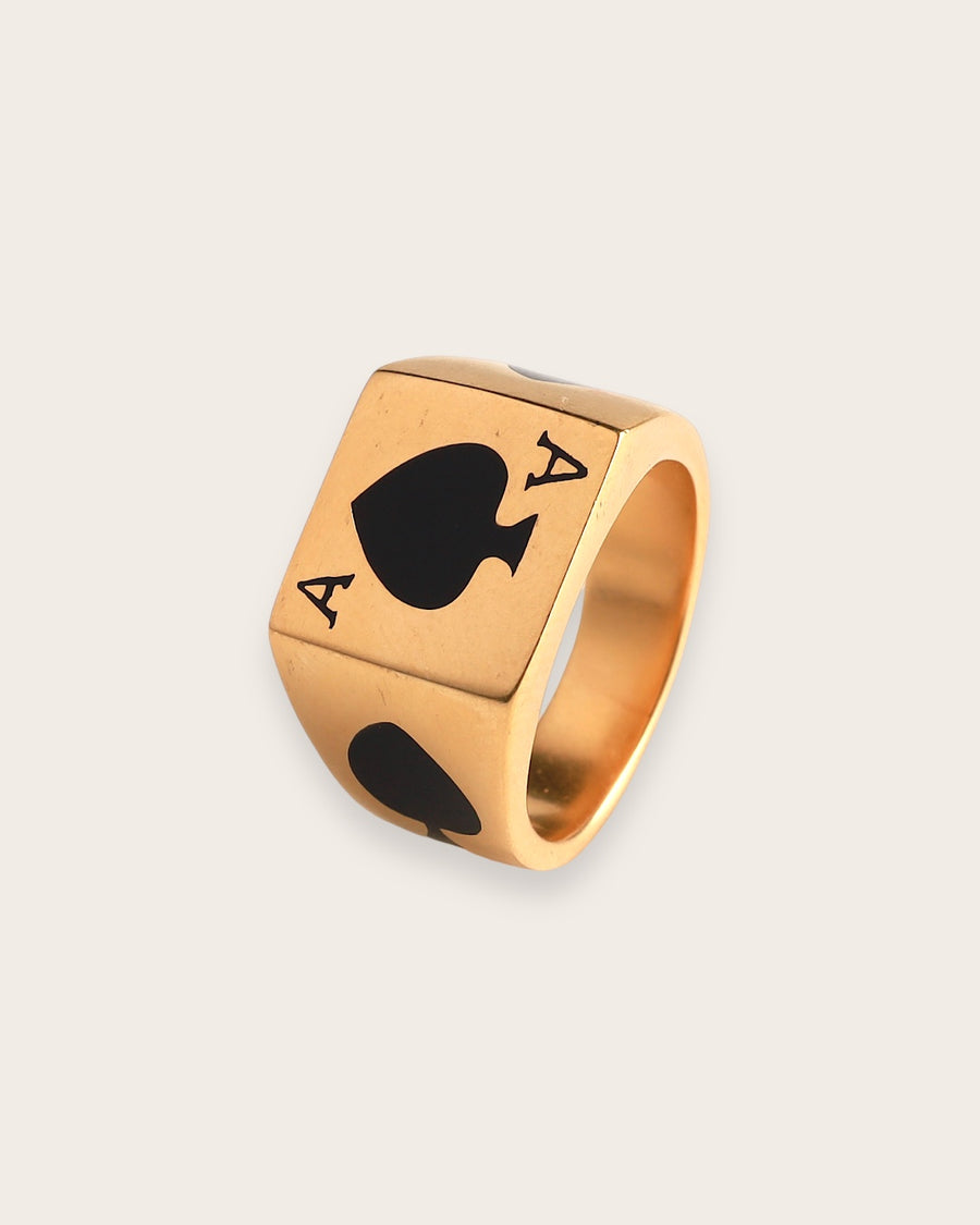 CARD RING WITH BLACK STONE IN GOLD