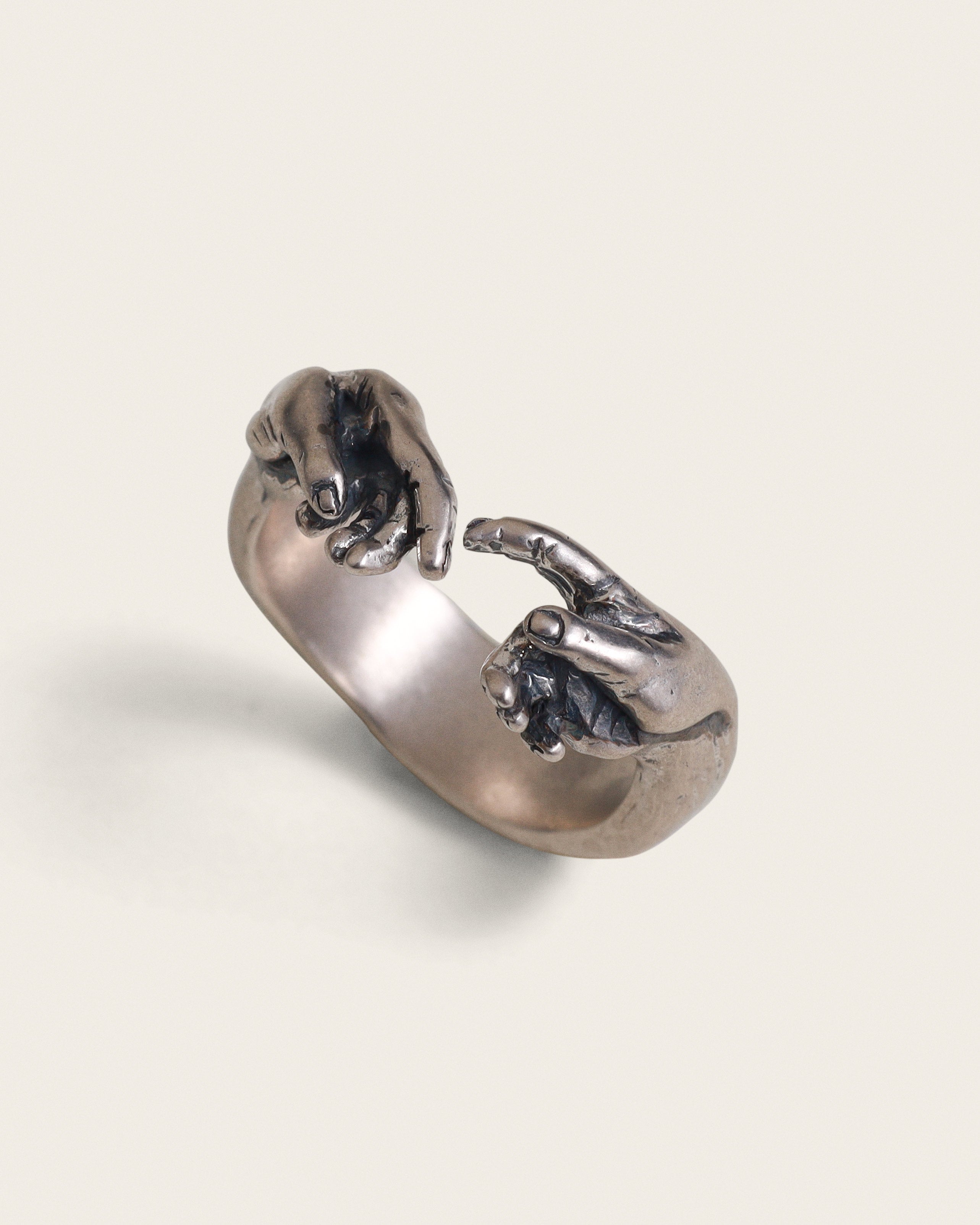 HAND OF GOD RING IN SILVER