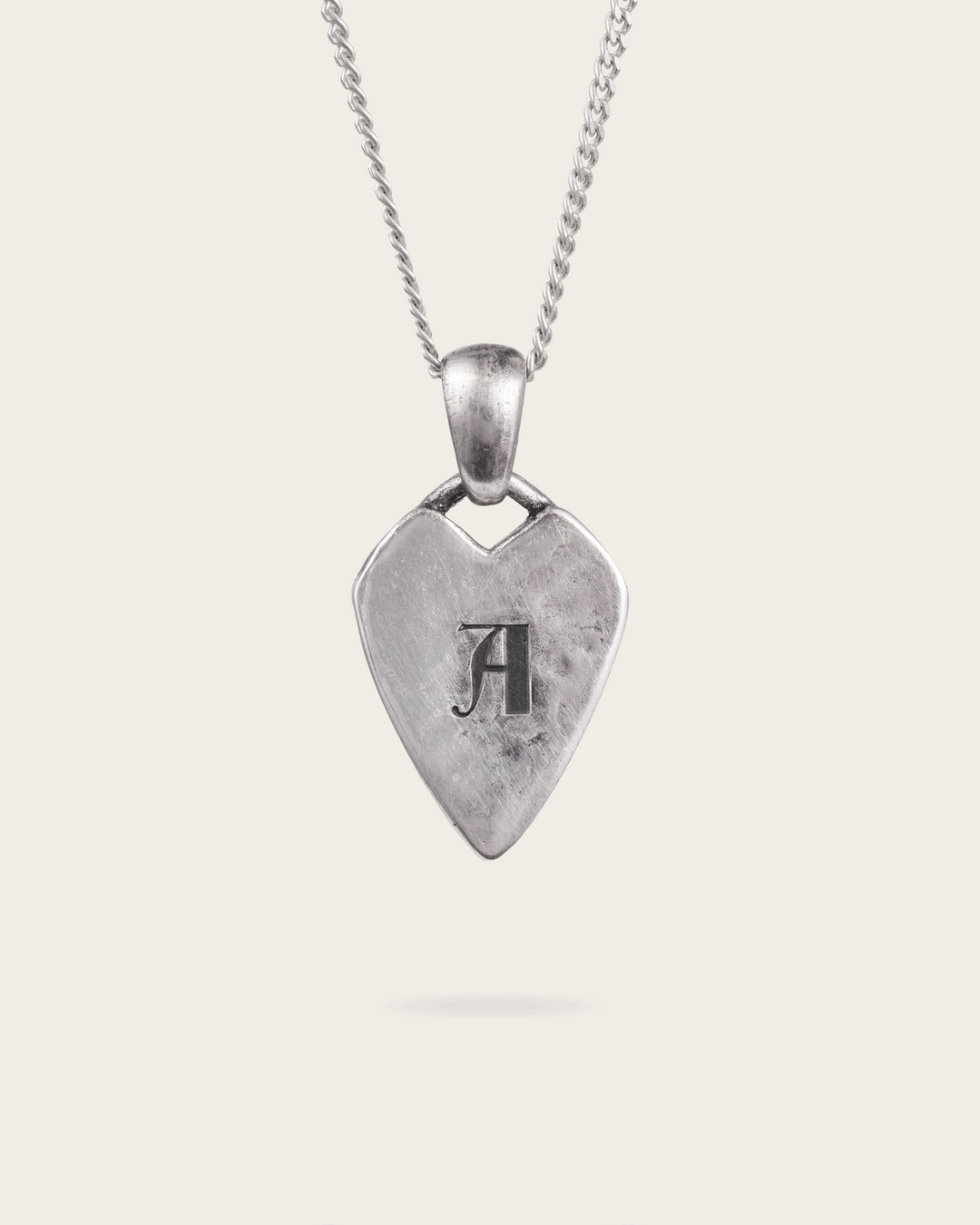 Sharp Heart Tag Pendant In Silver