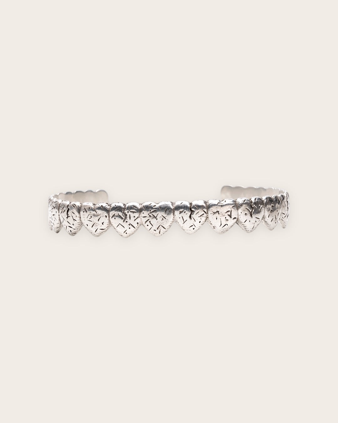 BROKEN HEART CUFF IN SILVER