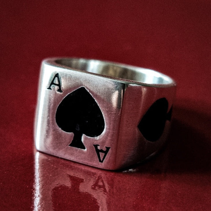 CARD RING WITH BLACK STONE IN SILVER