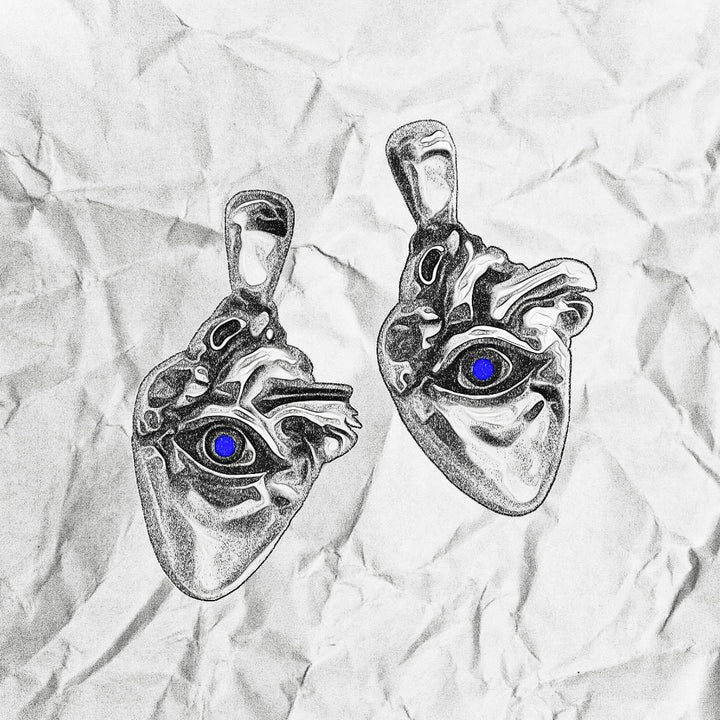 EYE HEART PENDANT WITH BLUE STONE IN SILVER