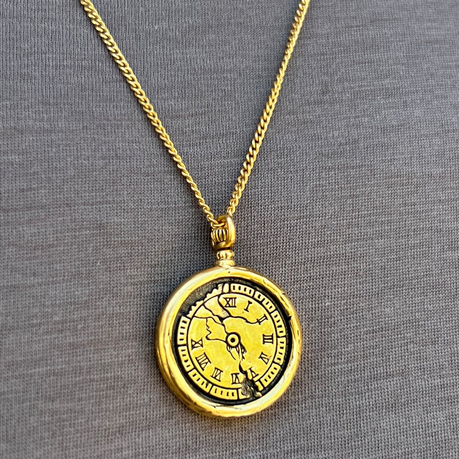 CRACKED CLOCK COMPASS IN GOLD